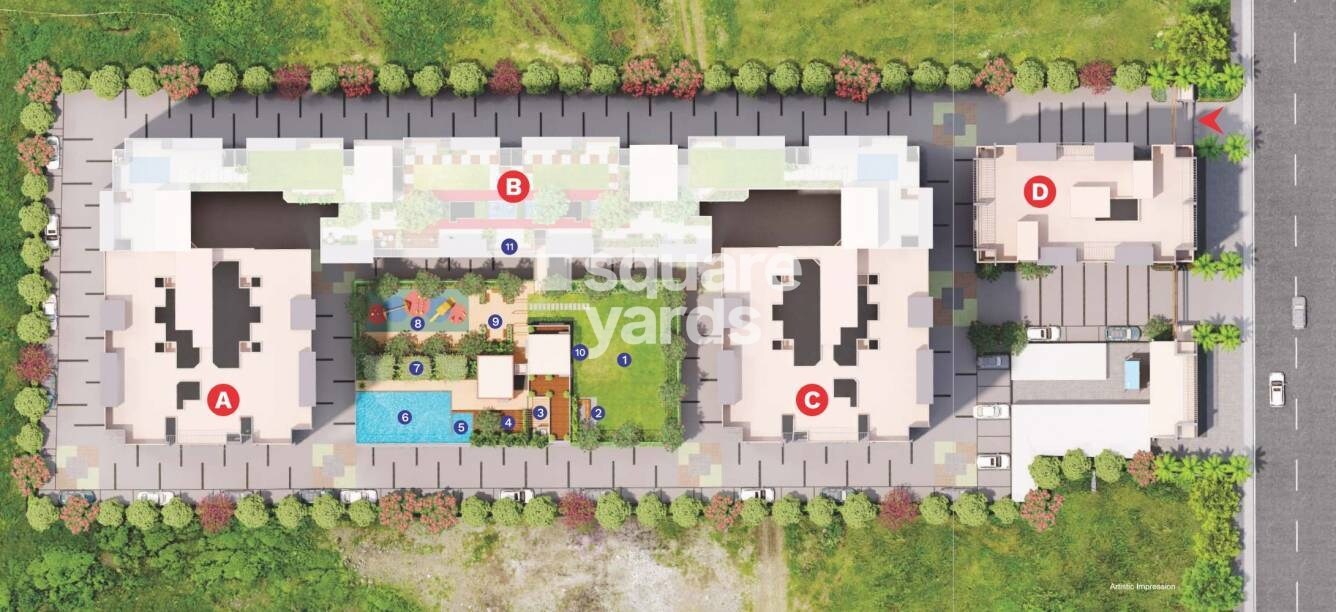 Wadhwani-Om-Manglam-Chaitanya_an aerial view of a building with a train on it