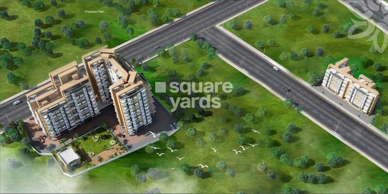 Jai-Bhawani-Vivantas-Bliss_an aerial view of a large building with a train on it