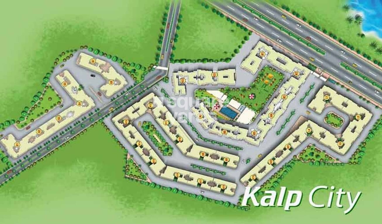 Kalp-City-Phase-II_an aerial view of a green field with a blue sky