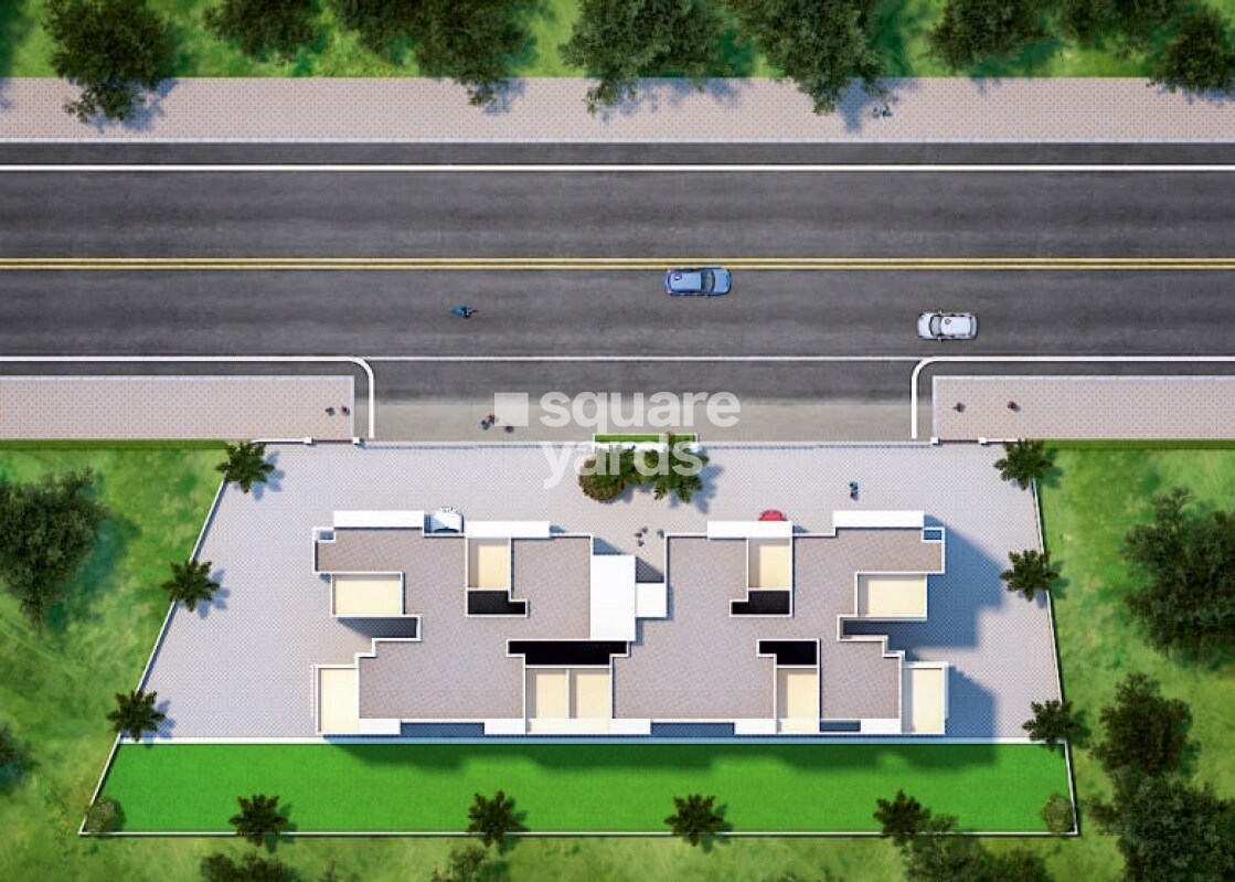 MK-Shivam-Paradise_a city street with a large building