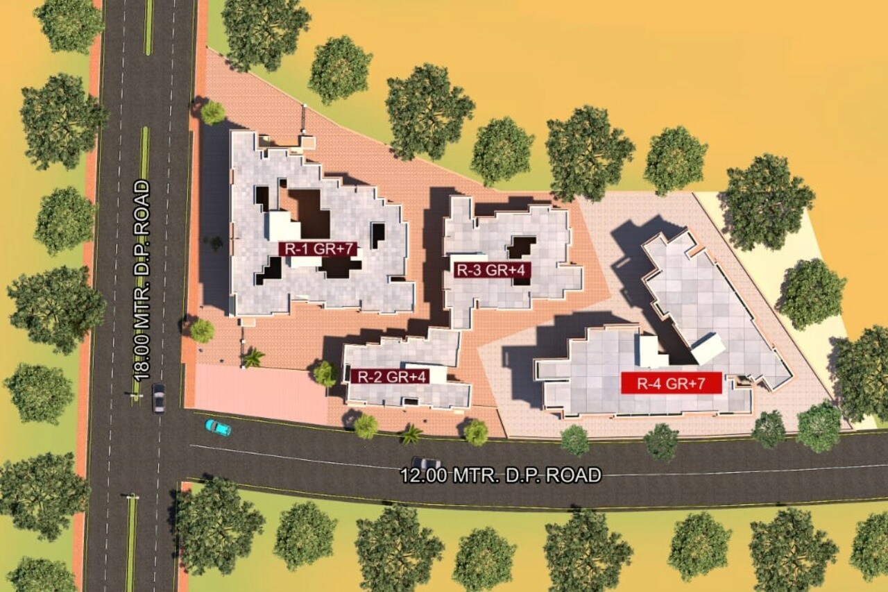 Panvelkar-Prestige-Phase-1_an aerial view of a large building with a train on it