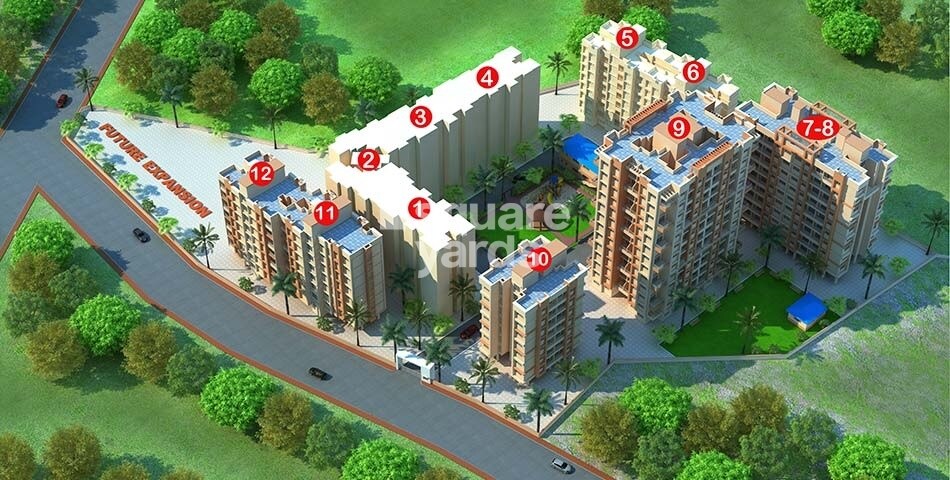 Patel-Prayosha-Yogi-Niwas_a large building with a lot of trees on top of it