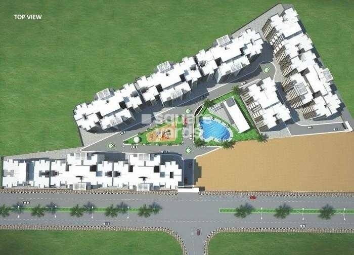 Patel-RPL-Jainam-Residency_a number of trucks on a road