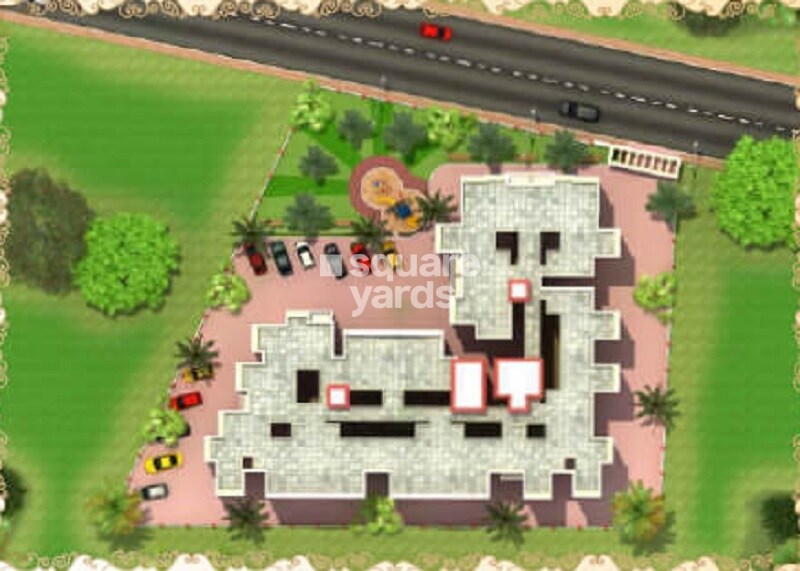 Shree-Khodiyar-Sahajeevan_an aerial view of a city with a train on the tracks