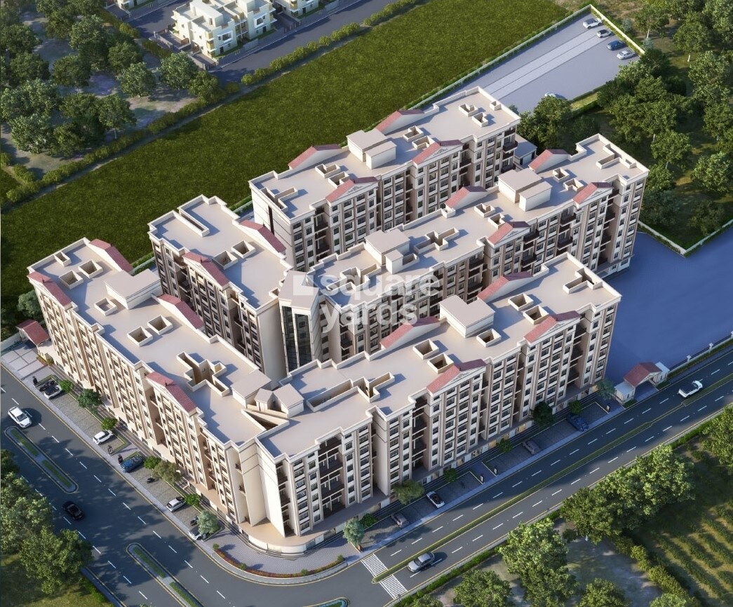 Shreeji-Nisarg-Phase-2_a large building with a lot of windows